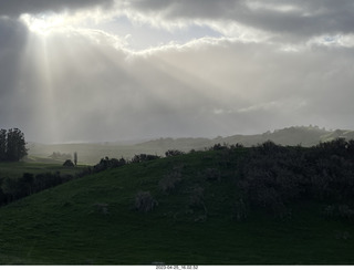 207 a1s. New Zealand - Spellbound Glowworm & Cave Tours - rays of sunlight