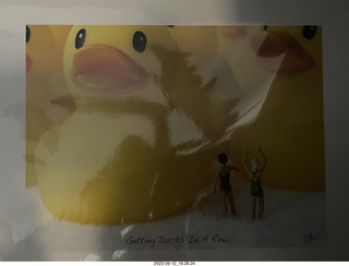 yellow duck pictures on the wall