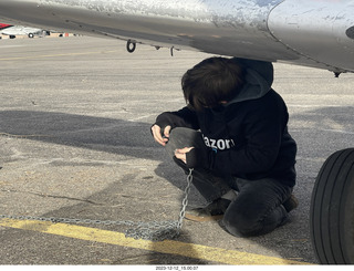 Canyonlands Airport (CNY) - Tyler figuring out the non-working chain