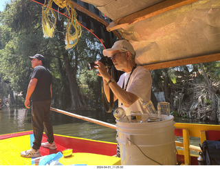 44 a24. Mexico City - Xochimilco Boat Trip - Howard Simkover taking a picture