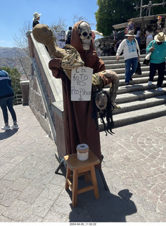 104 a24. Guanajuato - city view with death sculpture