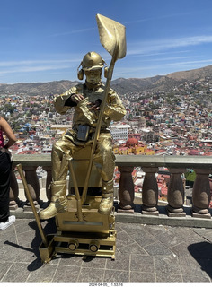 105 a24. Guanajuato - city view plaza with gold man