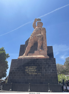 109 a24. Guanajuato - city view plaza with strong man sculpture