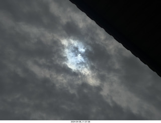 Torreon eclipse day - partial eclipse through clouds, attempt by iPhone