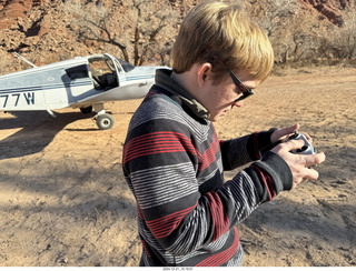 Tyler driving his drone Utah - Mexican Mountain airstrip - Tyler and his drone controls