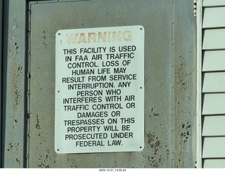 48 a2c. Utah - Hanksville Airport (HVE) - FAA warning door