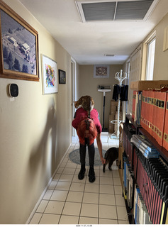 Ashley Saenz and cat Pickle on her back