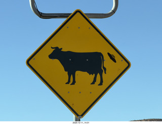 Utah Route 313 - cow sign with flying saucer UFO
