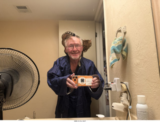 Ashley Saenz and cat Pickle on her back