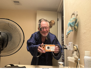 Ashley Saenz and cat Pickle on her back