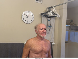 Adam nearly nude with my new bathroom mirror clock