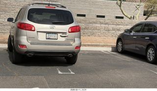 car in two spaces
