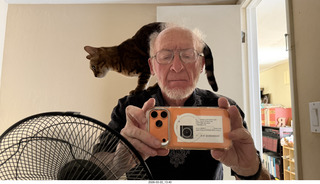 Adam with cat Pickle on my shoulder