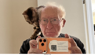 Adam with cat Pickle on my shoulder