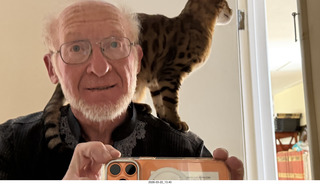 Adam with cat Pickle on my shoulder