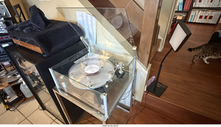 1 a2u. Transcriptor Skeleton turntable and Vestigal tonearm with clear vinyl record