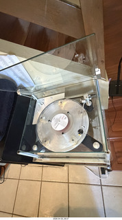 4 a2u. Transcriptor Skeleton turntable and Vestigal tonearm with clear vinyl record