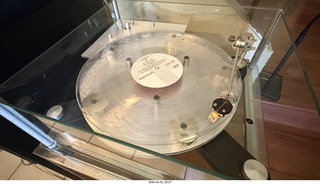 7 a2u. Transcriptor Skeleton turntable and Vestigal tonearm with clear vinyl record