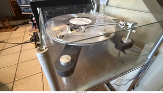 8 a2u. Transcriptor Skeleton turntable and Vestigal tonearm with clear vinyl record