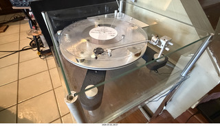 9 a2u. Transcriptor Skeleton turntable and Vestigal tonearm with clear vinyl record