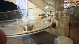 13 a2u. Transcriptor Skeleton turntable and Vestigal tonearm with clear vinyl record